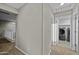 Hallway view with laundry room featuring modern washer and dryer at 1953 E Lafayette Ave, Gilbert, AZ 85298