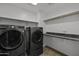 Laundry room featuring modern appliances and marble countertop at 1953 E Lafayette Ave, Gilbert, AZ 85298