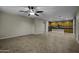 Open-concept living area with kitchen, dining, and patio access, offering modern living at 1953 E Lafayette Ave, Gilbert, AZ 85298