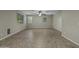A bright living room with a ceiling fan and tile floors at 1953 E Lafayette Ave, Gilbert, AZ 85298