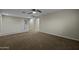 Bright upstairs loft area with plush carpeting, neutral walls, and a cozy atmosphere at 1953 E Lafayette Ave, Gilbert, AZ 85298