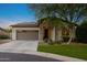 Charming single-story home with a two-car garage, desert landscaping, and a welcoming front porch at 20438 W Calle Encorvada --, Buckeye, AZ 85396