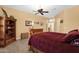Bedroom featuring rustic bed frame and adjacent doorway at 2069 E Winchester Way, Chandler, AZ 85286