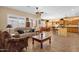 Spacious living area featuring tiled floors, open layout, and ample natural light, great for entertaining at 2069 E Winchester Way, Chandler, AZ 85286