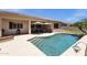 Inviting backyard pool with lounge area and outdoor dining beneath a covered patio at 2069 E Winchester Way, Chandler, AZ 85286