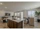 Open floor plan showcases a spacious living room with modern furnishings and ample natural light at 2121 W Sonoran Desert Dr # 86, Phoenix, AZ 85085