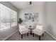Inviting seating area with chairs and modern art, perfect for a cozy conversation at 2213 N Ashbrook Cir, Mesa, AZ 85213