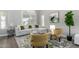 Bright living room with neutral colors, large windows, and modern furniture at 2213 N Ashbrook Cir, Mesa, AZ 85213