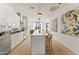 Bright, open-concept kitchen with stainless steel appliances and a kitchen island at 312 E Windsor Ave # 6, Phoenix, AZ 85004