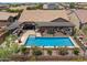 Large pool, outdoor living area, desert landscaping, and shade coverings in a well-designed backyard oasis at 33305 N 26Th Ave, Phoenix, AZ 85085