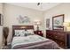 Inviting bedroom with decorative accents and a comfortable-looking bed at 33305 N 26Th Ave, Phoenix, AZ 85085