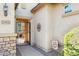 Gated entryway with stone accents and charming 'Hello Summer' sign at 33305 N 26Th Ave, Phoenix, AZ 85085