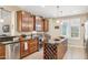 Modern kitchen with stainless steel appliances, granite countertops, and wine rack at 33305 N 26Th Ave, Phoenix, AZ 85085
