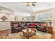 Spacious living room featuring an extra large sectional and neutral walls at 33305 N 26Th Ave, Phoenix, AZ 85085