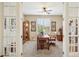Private office with french doors, custom built-ins, and natural light at 33305 N 26Th Ave, Phoenix, AZ 85085