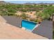 View of pool and mountains, showing private backyard with shade, plantings and space for seating at 33305 N 26Th Ave, Phoenix, AZ 85085