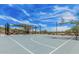 Community basketball court featuring shade structures, playground and picnic areas at 3704 E Haflinger Rd, San Tan Valley, AZ 85140