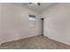 Bedroom with neutral carpet, and a window with natural light at 3704 E Haflinger Rd, San Tan Valley, AZ 85140