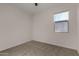 Cozy bedroom featuring neutral tones and a window providing natural light at 3704 E Haflinger Rd, San Tan Valley, AZ 85140