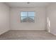 Cozy bedroom featuring neutral carpet and a window with natural light at 3704 E Haflinger Rd, San Tan Valley, AZ 85140