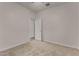 Neutral bedroom with carpet, ceiling fan, and a door to an adjacent room at 3704 E Haflinger Rd, San Tan Valley, AZ 85140
