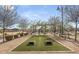 Community recreation area featuring bocce ball and shaded seating with views of the neighborhood at 3704 E Haflinger Rd, San Tan Valley, AZ 85140