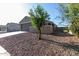 Beige home with desert landscaping at 3704 E Haflinger Rd, San Tan Valley, AZ 85140