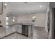 Kitchen with island, stainless steel appliances, tile floors and recessed lighting at 3704 E Haflinger Rd, San Tan Valley, AZ 85140