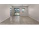 Bright living room with tile floors and recessed lighting at 3704 E Haflinger Rd, San Tan Valley, AZ 85140