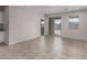 Bright living room featuring tile floors and recessed lighting at 3704 E Haflinger Rd, San Tan Valley, AZ 85140