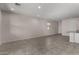 Bright living room with tile floors and recessed lighting at 3704 E Haflinger Rd, San Tan Valley, AZ 85140
