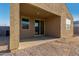 Covered patio with stucco and access from sliding glass doors to backyard area at 3704 E Haflinger Rd, San Tan Valley, AZ 85140