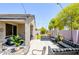 Private backyard with covered patio, outdoor seating, and string lights for evening relaxation at 3947 W Maggie Dr, San Tan Valley, AZ 85144