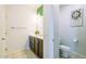 Bright bathroom featuring a double vanity and a separate toilet room, offering convenience and privacy at 3947 W Maggie Dr, San Tan Valley, AZ 85144