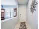 Inviting hallway featuring a decorative mirror and view to an office at 3947 W Maggie Dr, San Tan Valley, AZ 85144