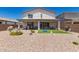 Spacious backyard with covered patio at 40141 W James Ln, Maricopa, AZ 85138