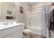 Bright bathroom featuring a shower, vanity, and modern fixtures at 40141 W James Ln, Maricopa, AZ 85138