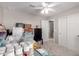 A bedroom filled with boxes and miscellaneous items at 40141 W James Ln, Maricopa, AZ 85138
