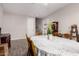 Open dining area features tile floors and neutral walls for a clean and inviting space at 40141 W James Ln, Maricopa, AZ 85138