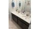 Bathroom featuring dual sinks, framed mirror, and ample counter space at 4040 E Caitlin Dr, San Tan Valley, AZ 85140