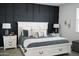 Stylish bedroom with a white bed frame, decorative pillows, and trendy nightstands at 4040 E Caitlin Dr, San Tan Valley, AZ 85140