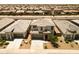 Stunning aerial view of a home showcasing its well-maintained landscaping and neighborhood at 40927 W Sunland Dr, Maricopa, AZ 85138