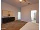 Expansive bedroom featuring carpet, modern decor, and great natural lighting at 40927 W Sunland Dr, Maricopa, AZ 85138