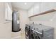 Laundry room featuring a new washer and dryer at 4154 W Morten Ave, Phoenix, AZ 85051