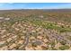 Houses in a community next to a golf course as viewed from above at 4402 E Barwick Dr, Cave Creek, AZ 85331