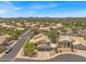 Community aerial view with desert landscaping, community streets and mountain views at 4402 E Barwick Dr, Cave Creek, AZ 85331