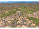 Desert community homes with golf course and lake as seen from above on a sunny day at 4402 E Barwick Dr, Cave Creek, AZ 85331
