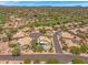 Expansive aerial showcasing the desert homes with swimming pools near a golf course at 4402 E Barwick Dr, Cave Creek, AZ 85331