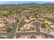 Aerial view capturing the beautiful desert community near the golf course and green spaces at 4402 E Barwick Dr, Cave Creek, AZ 85331