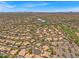 An overhead view of houses in a desert community near a golf course at 4402 E Barwick Dr, Cave Creek, AZ 85331
